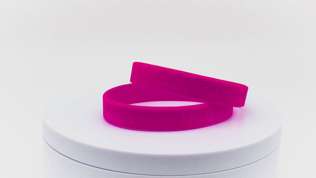 Video of dark pink silicone wristbands with debossing