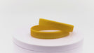 Video of yellow silicone wristbands with debossing