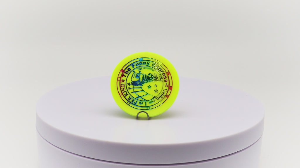 Video of yellow token with rainbow gradient printing