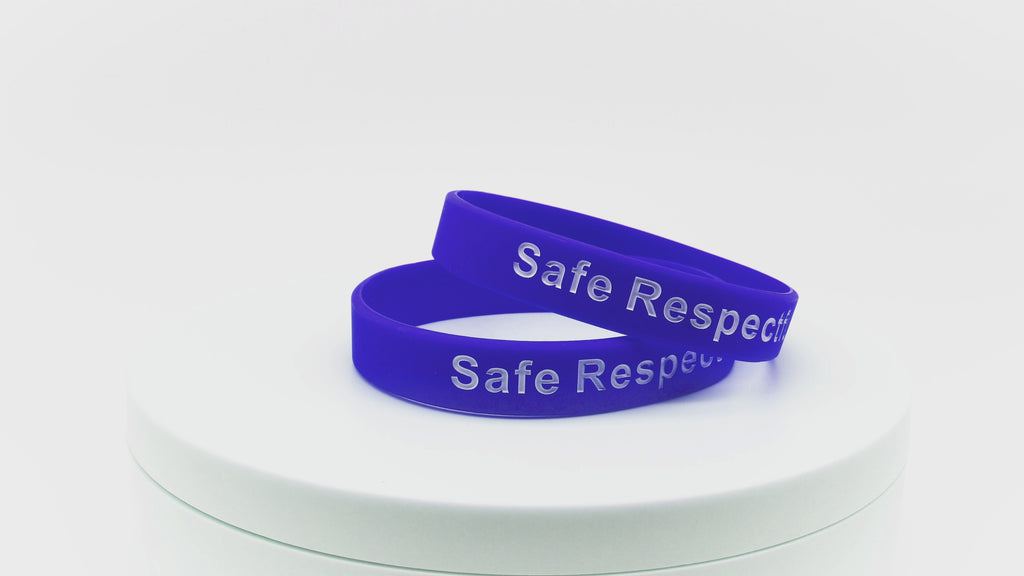 Video of dark blue silicone wristbands with white printing