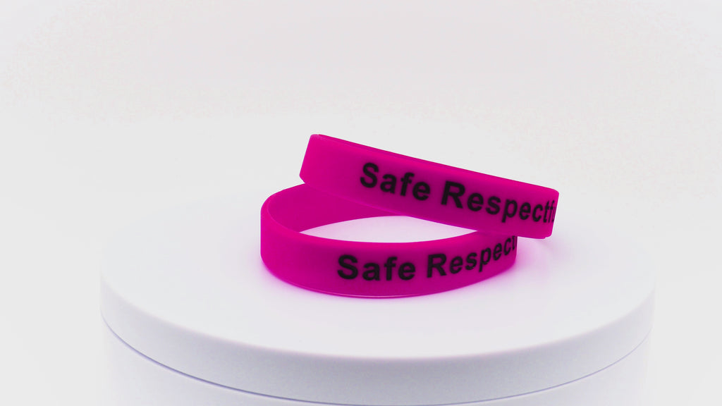 Video of dark pink wristbands with black printing