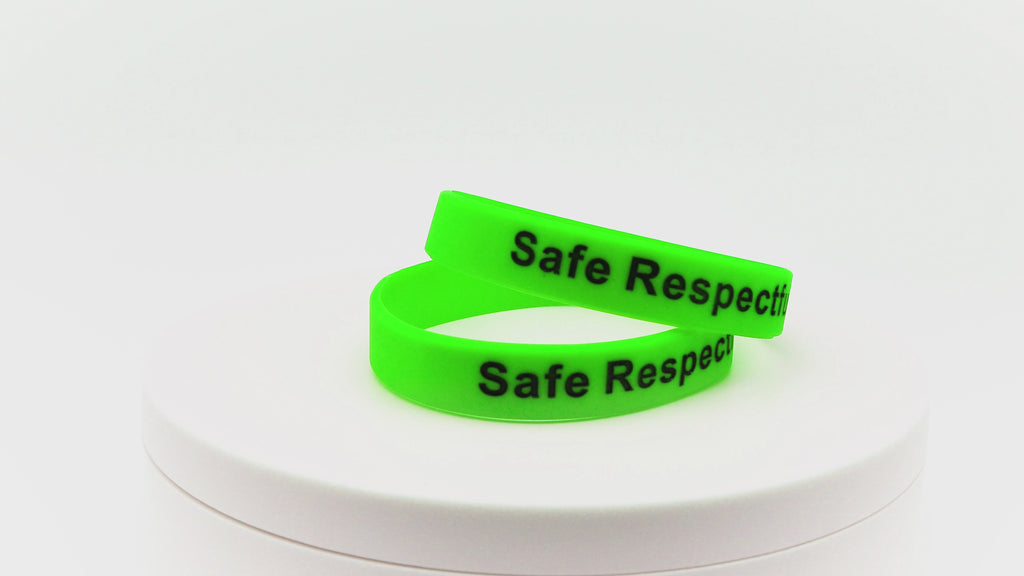 Video of neon green silicone wristbands with black printing