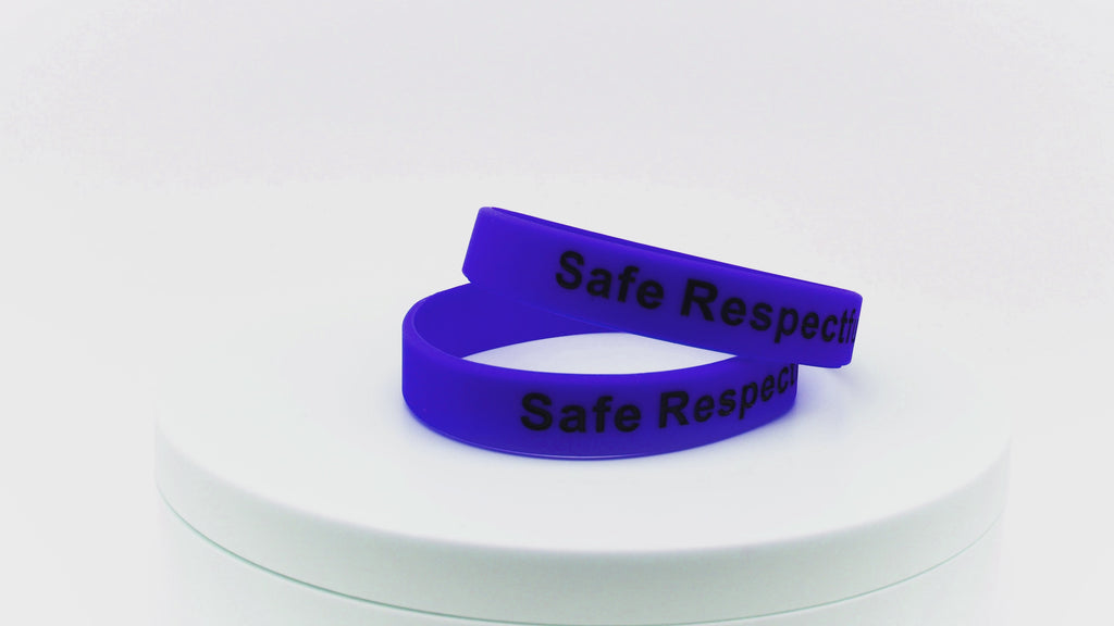 Video of dark blue silicone wristbands with black printing