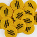 Yellow reward tokens with black printing