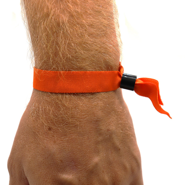 Close Up Of An Orange Fabric Wristband