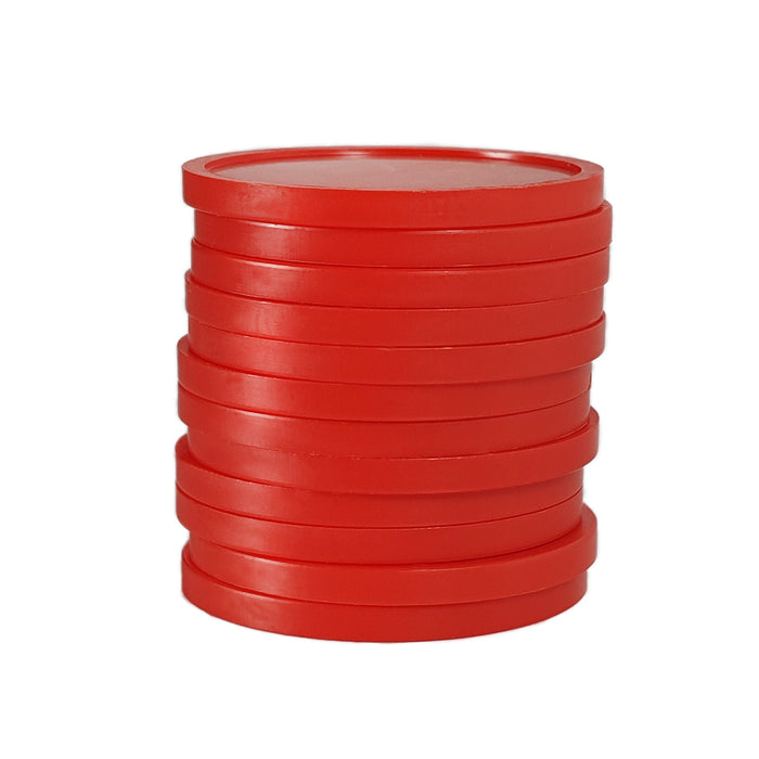 A Stack Of Red Reward Tokens That Are Made From Recycled Plastic