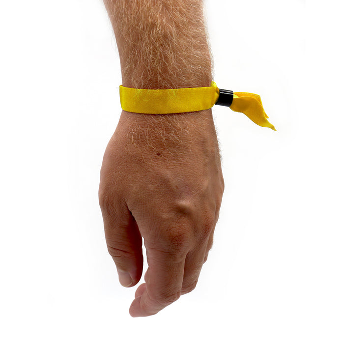 Yellow Fabric Wristbands Worn Around Arm