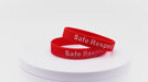 Video of red silicone wristbands with white printing