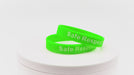 Video of neon green silicone wristbands with white printing