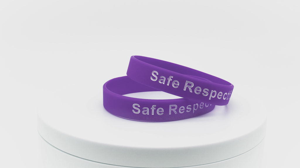 video of purple silicone wristbands with white printing