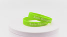 Video of lime green silicone wristbands with white printing