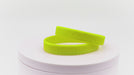 Video of neon yellow silicone wristbands with debossing